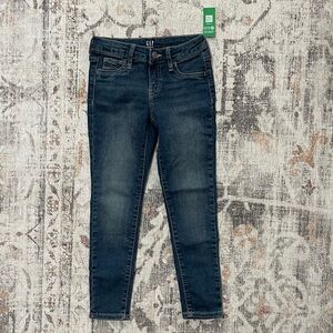 Gap Kids - dark wash skinny jeans with a zip fly and button closure #jeans